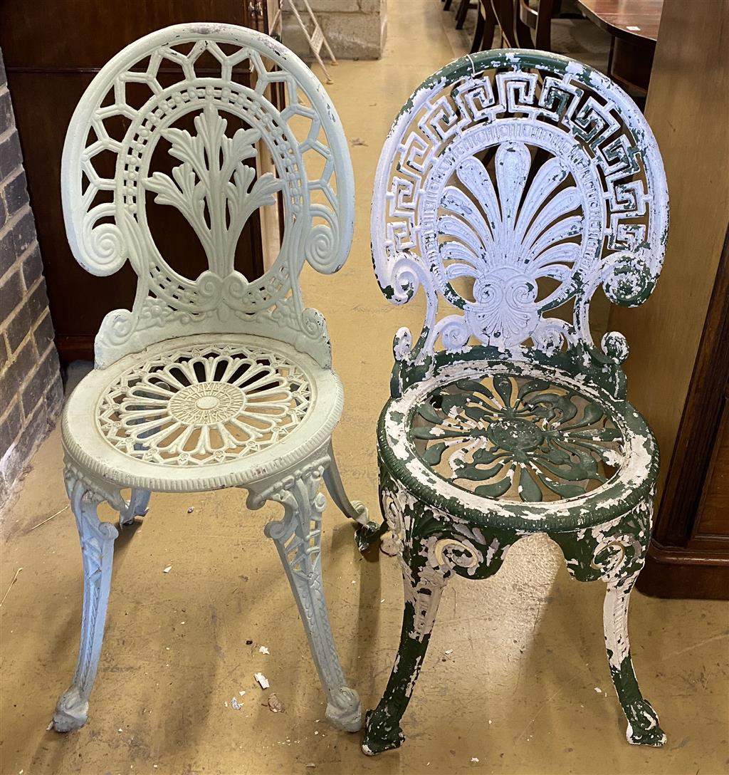 A painted aluminium circular garden table, 60cm diameter and two chairs